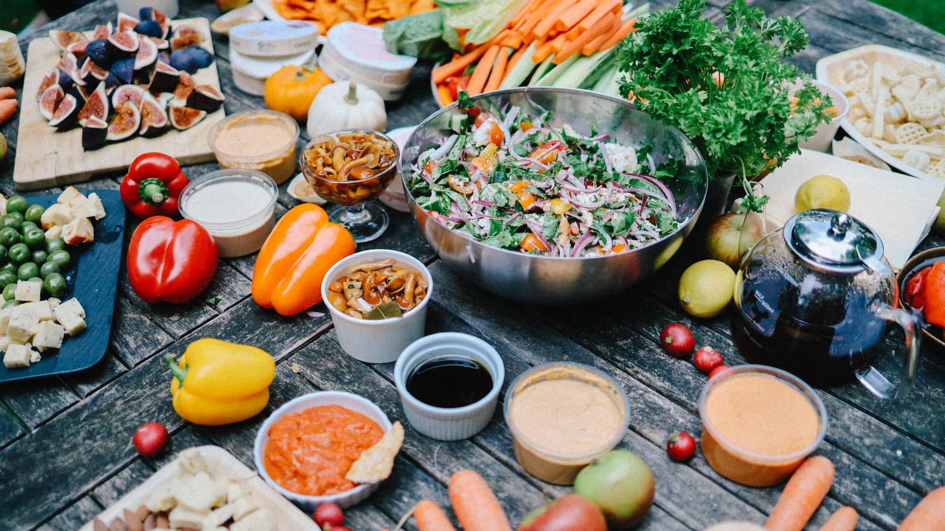 Spread of fresh healthy food on a wooden table